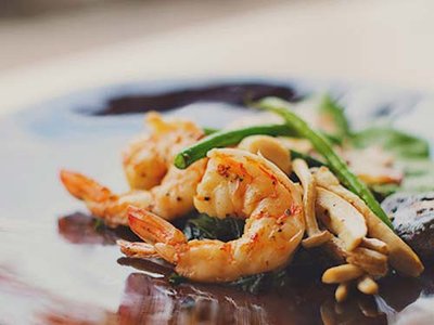 Chef Preparing Sushi Rolls